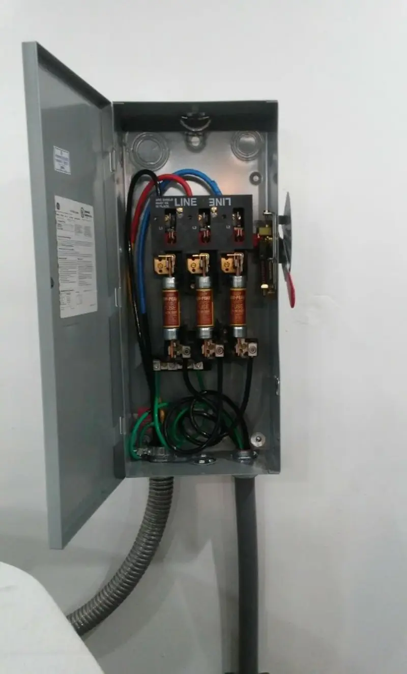 Three-phase disconnect switch installed for Smoke Detector Installation in East Hampton